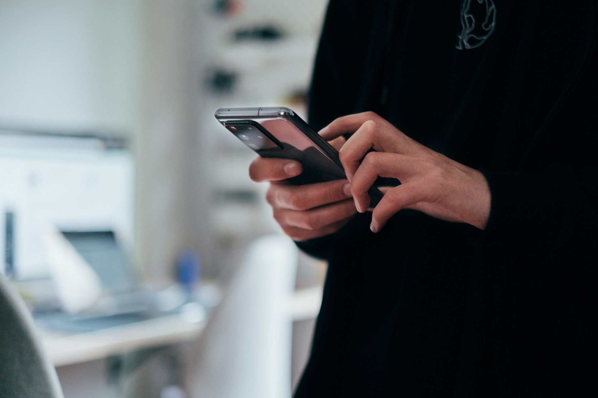 Person operating a smartphone