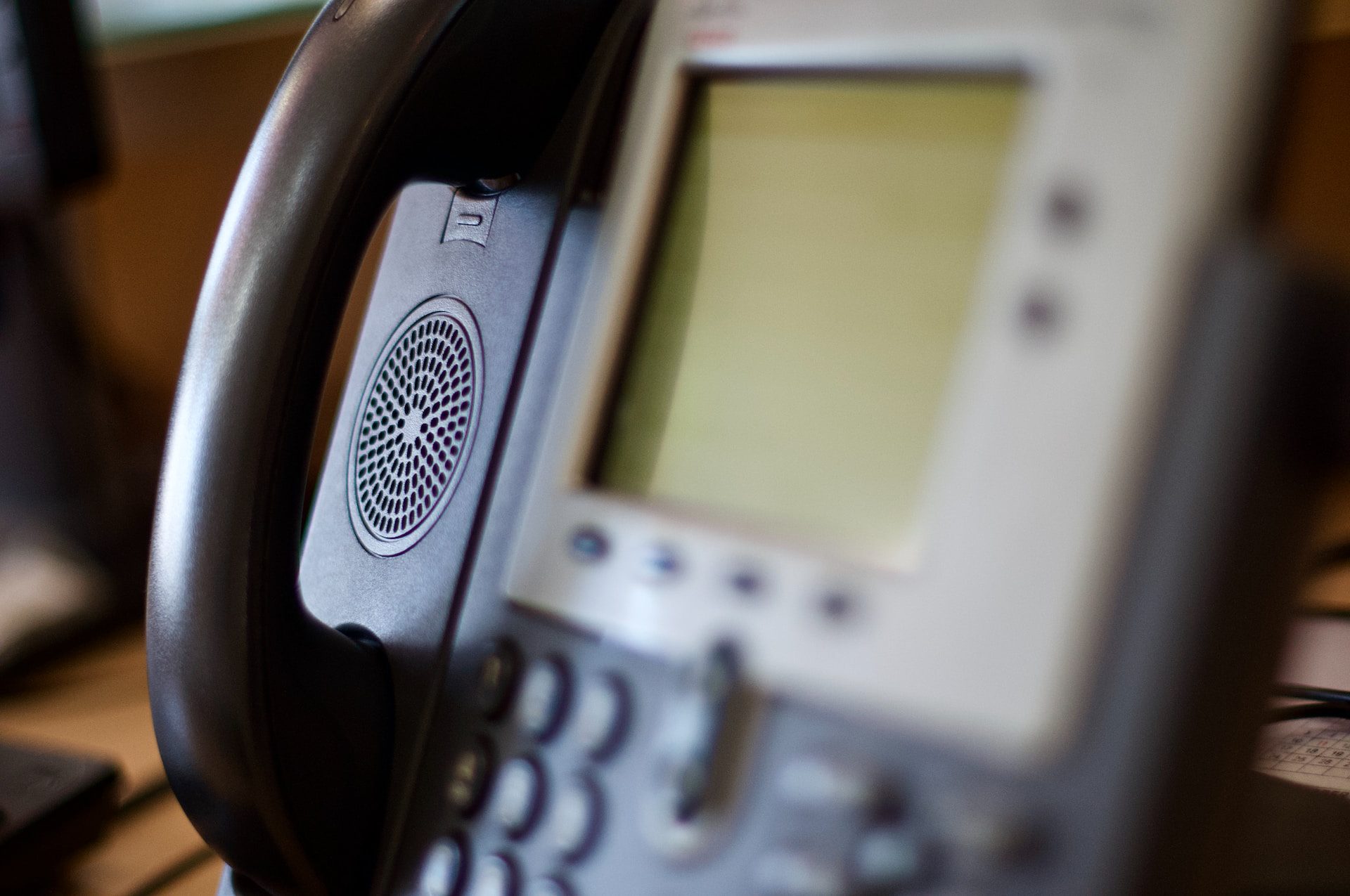 A close-up of a landline handset system.
