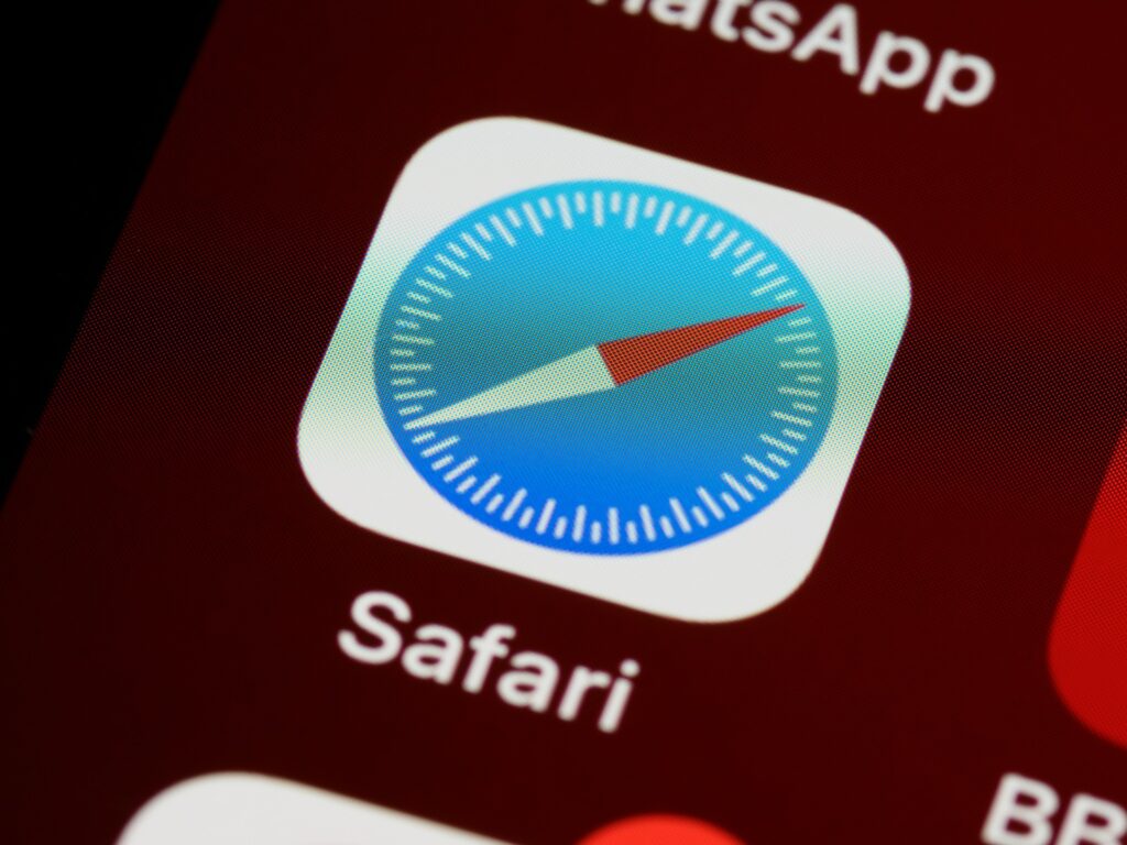 A close-up photo of an iPhone's screen, showing the Safari app